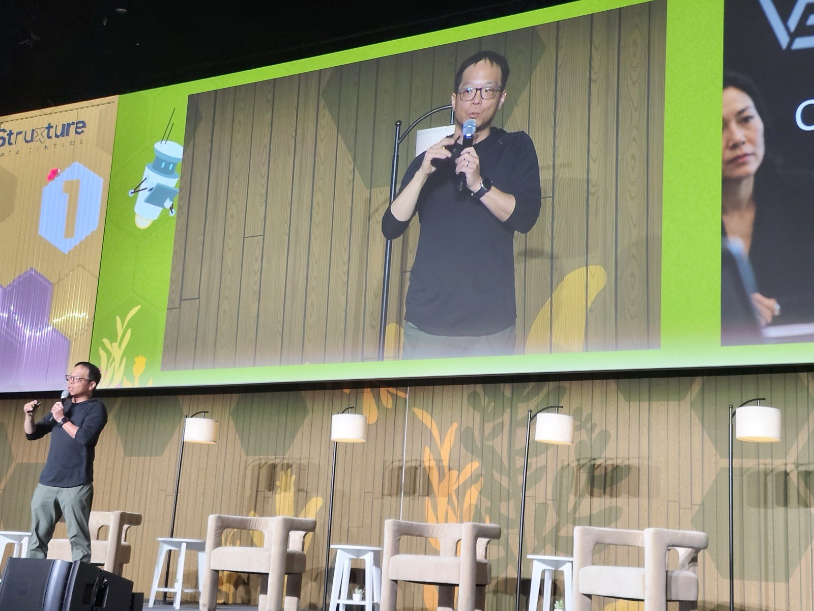 Steve Liang presenting on stage at Upper Bound 2026 in Edmonton